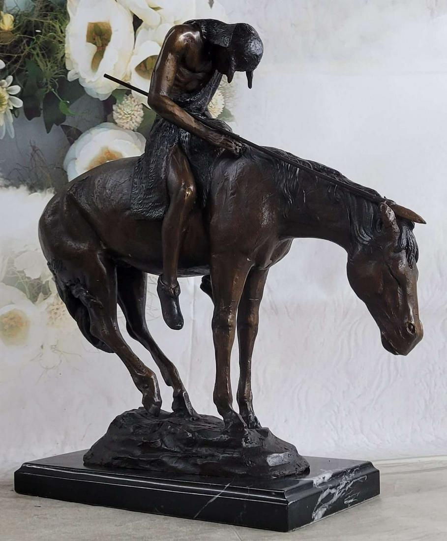 FREDERIC REMINGTON "END OF TRAIL" BRONZE SCULPTURE: Total Dimensions: Height 16'' x Width 15''Approximate Weight: 17 LBSOriginal Reproduction: Reproduction