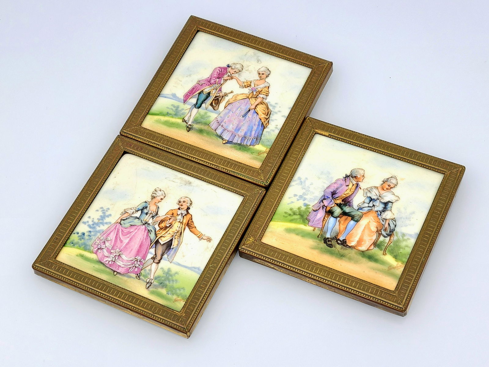 Antique hand painted porcelain wall plaques: each measures 3" x 3" excellent condition