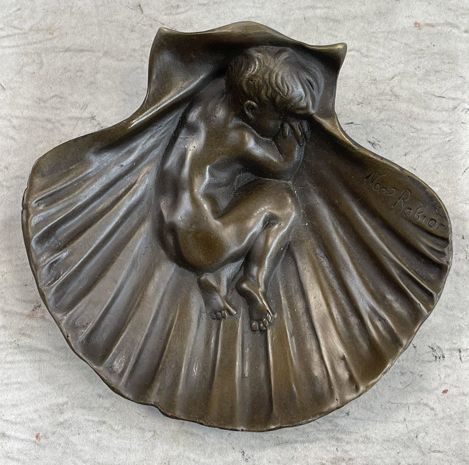 Nude Naked Boy Sleeping Ashtray Bronze: Total Dimensions: Height 2'' x Width 6''Approximate Weight: 2 LBSOriginal Reproduction: Reproduction