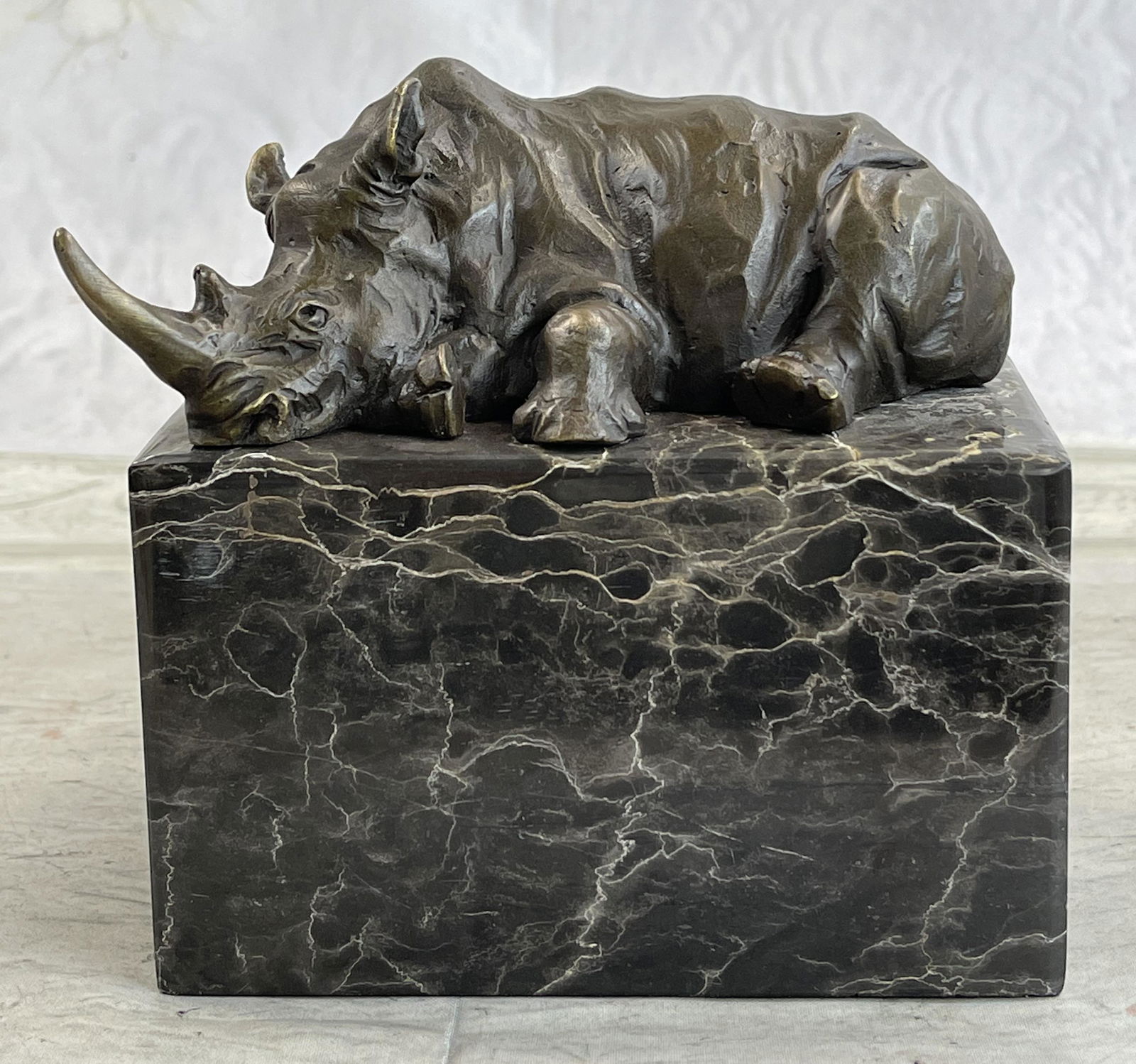 Rhino Bookend Bronze Sculpture: Total Dimensions: Height 6'' x Width 6''Approximate Weight: 7 LBSOriginal Reproduction: Original