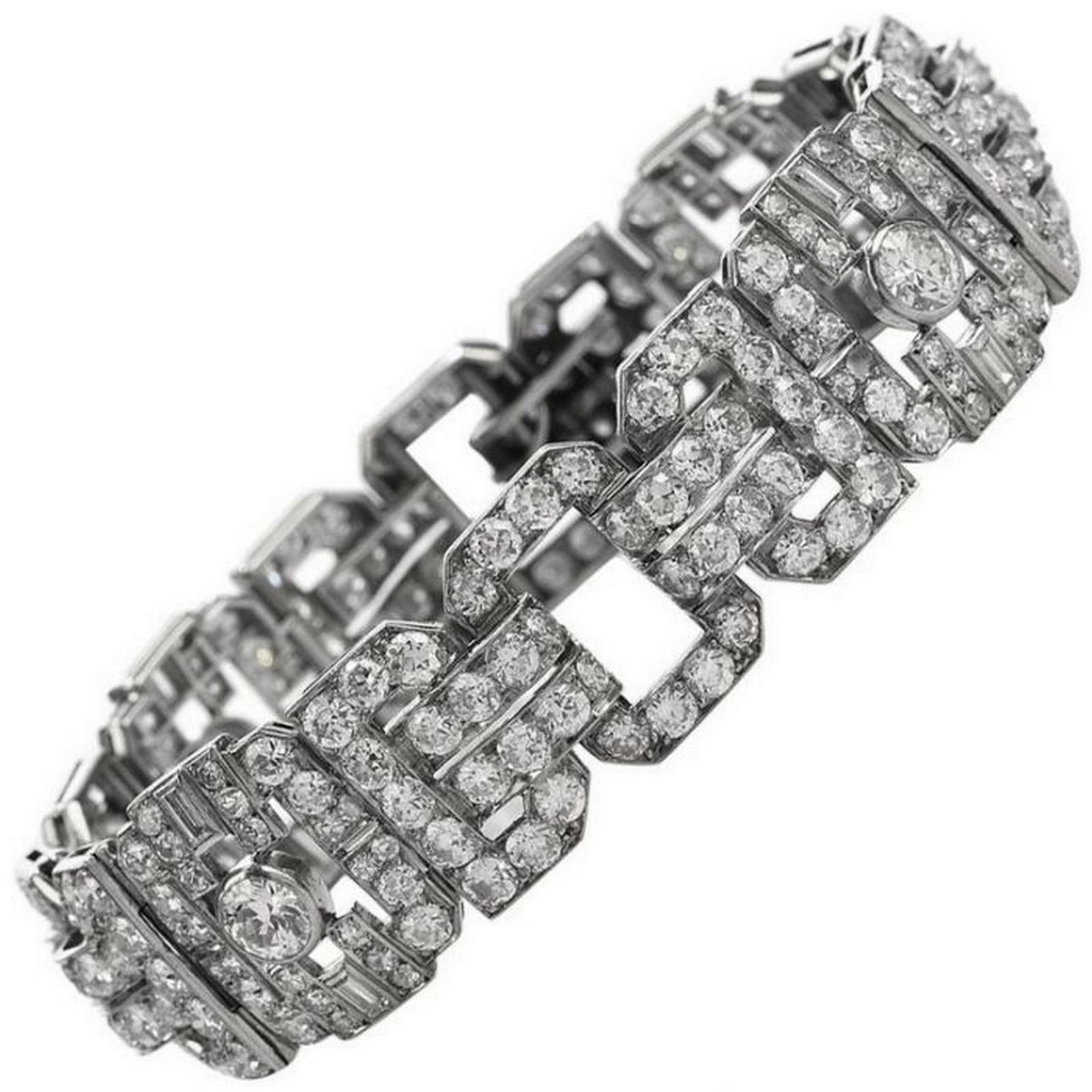 Antique 1930s Diamond Platinum Art Deco Link Bracelet: The open style links are adorned with 8 Baguette Cut & 284 Round European Cut Diamonds, weighing cumulatively 13.10 carats with similar G-H color, VS clarity. Along the center, 4 larger European cut D