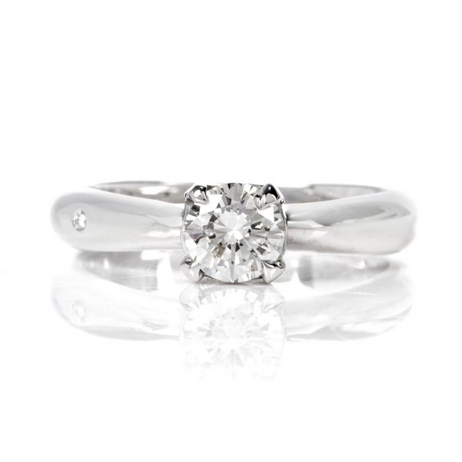 Chimento Diamond 18K White Gold Italian Engagement Ring: This classic diamond Italian made engagement ring is crafted in 18-karat white gold. Centered is a single prong set round-brilliant diamond weighing approximately, 0.57 carats, graded H color, and VS1