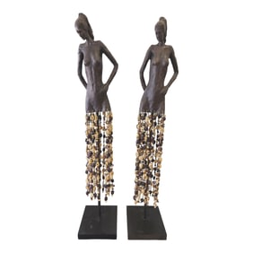 In the manner of Olbram Zoubek Czech, 1926-2017, life size women sculptures with beaded skirts