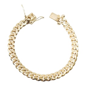 thick 14k yellow gold Cuban link bracelet