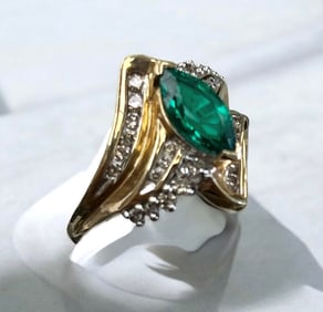 Green stone and Diamonds Ring