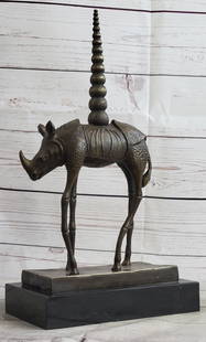 Salvador Dali Cosmic Rhinoceros Surreal Rhino Bronze Sculpture: Bronze Dimensions with Marble Base: Height 13.5" X Width 7.5"Marble Dimensions:7.5" X 4.5"Height without base:12.5"Weight:8 LBSOriginal or Reproduction: Reproduction