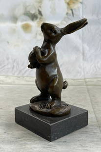 Milo Bunny with Basket Bronze Sculpture: Bronze Dimensions with Marble Base: Height 5.5" x Width 3"Marble Dimensions: 3" X 3"Height without base: 5".Weight : 2 LBSOriginal or Reproduction: Original
