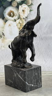 Milo Elephant Bronze Statue: Bronze Dimensions with Marble Base: Height 12" X Width 10"Marble Dimensions:5" X 3"Height without base:9"Weight:10 LBS Original or Reproduction: Original