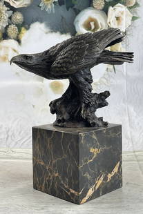 Milo Falcon Bronze Statue: Total Dimensions: Height 10'' x Width 8''Approximate Weight: 10 LBSOriginal or Reproduction: Original