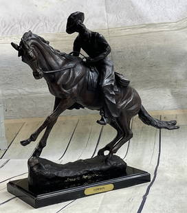 Remington "Cowboy" Bronze Sculpture: Total Dimensions: Height 17'' x Width 21''Approximate Weight: 22 LBSOriginal or Reproduction: Reproduction