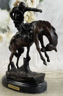 Remington "Charles Russell" Rodeo Statue: Total Dimensions: Height 10'' x Width 10''Approximate Weight: 7 LBSOriginal Reproduction: Reproduction
