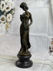 Young lady Gazes into a Flower by Moreau Bronze