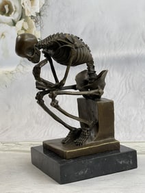 Milo SKELETON GUARD BOOK BRONZE