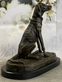 A. Calli Service Dog w/ Vest Statue