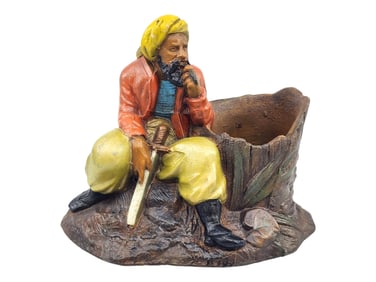 Vintage cast iron sculpture of arab man