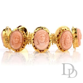 Vintage Carved Coral Cameo 18K Gold Link Bracelet. Measuring appx. 24.38mm x 7.25 Inch. Weighs 72.7