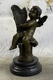 A. Moreau Cherub Playing Harp Cherubim Statue Sculpture: Total Dimensions: Height 8'' x Width 5''Approximate Weight: 4 LBSOriginal Reproduction: Reproduction