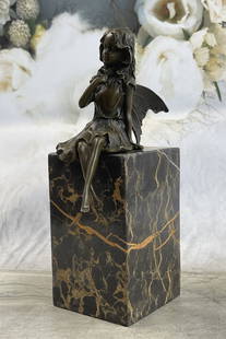 Valentine Angel Holding Flower Bronze Figurine Book-End Bookend: Total Dimensions: Height 9'' x Width 8''Approximate Weight: 8 LBSOriginal Reproduction: Original