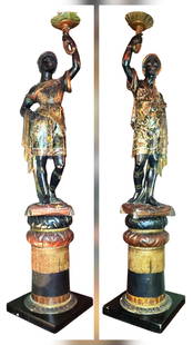 A PAIR OF 19TH C. VENETIAN EBONISED, GILT & POLYCHROME BLACKAMOOR FIGURAL TORCHERES: A PAIR OF 19TH C. VENETIAN EBONISED, GILT & POLYCHROME BLACKAMOOR FIGURAL TORCHERES. H 84"