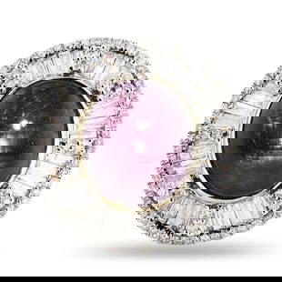 13.72ct UNHEATED Star Ruby and 1.55ctw Diamond 14K Yellow Gold Ring: #Description:# Fourteen karat (14K) yellow gold star ruby and diamond ring. An oval cabochon cut star ruby corundum gemstone is prong mounted in the center of the ring. Baguette and round brilliant cu