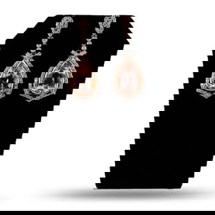 17.31ctw Morganite and 2.38ctw Diamond 14K Rose and White Gold Earrings: Fourteen karat (14K) two tone gold natural morganite beryl and diamond earrings. Two (2) pear cut natural morganite beryl gemstones are mounted in the center of the earrings. Round brilliant cut diamo