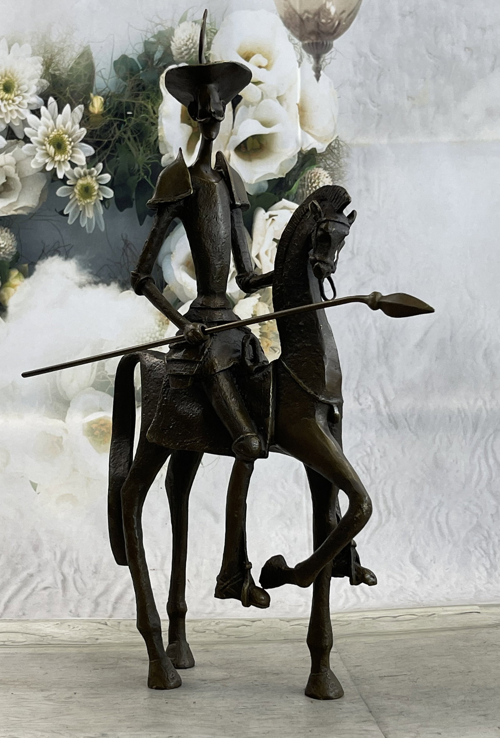 Salvador Dali ''Don Quixote'' On Horse Bronze Sculpture: Total Dimensions: Height 18'' x Width 13''Approximate Weight: 10 LBSOriginal Reproduction: Reproduction