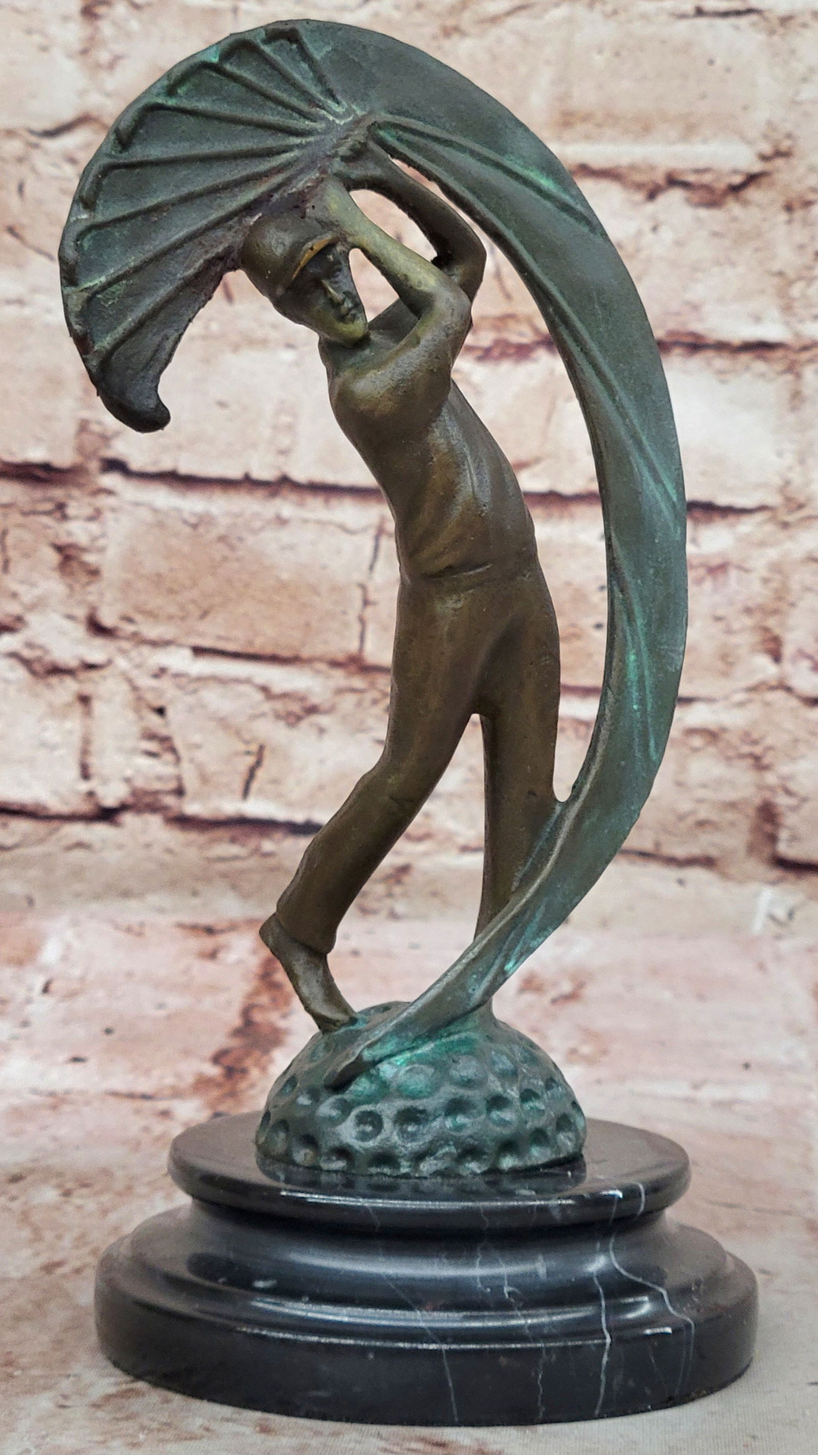 Golfer Swing Sculpture on Marble Base: Bronze Dimensions with Marble Base: Height 8" X Width 4"Marble Dimensions: Diameter 4"Height without base:7"Weight:4 LBSOriginal or Reproduction: Original