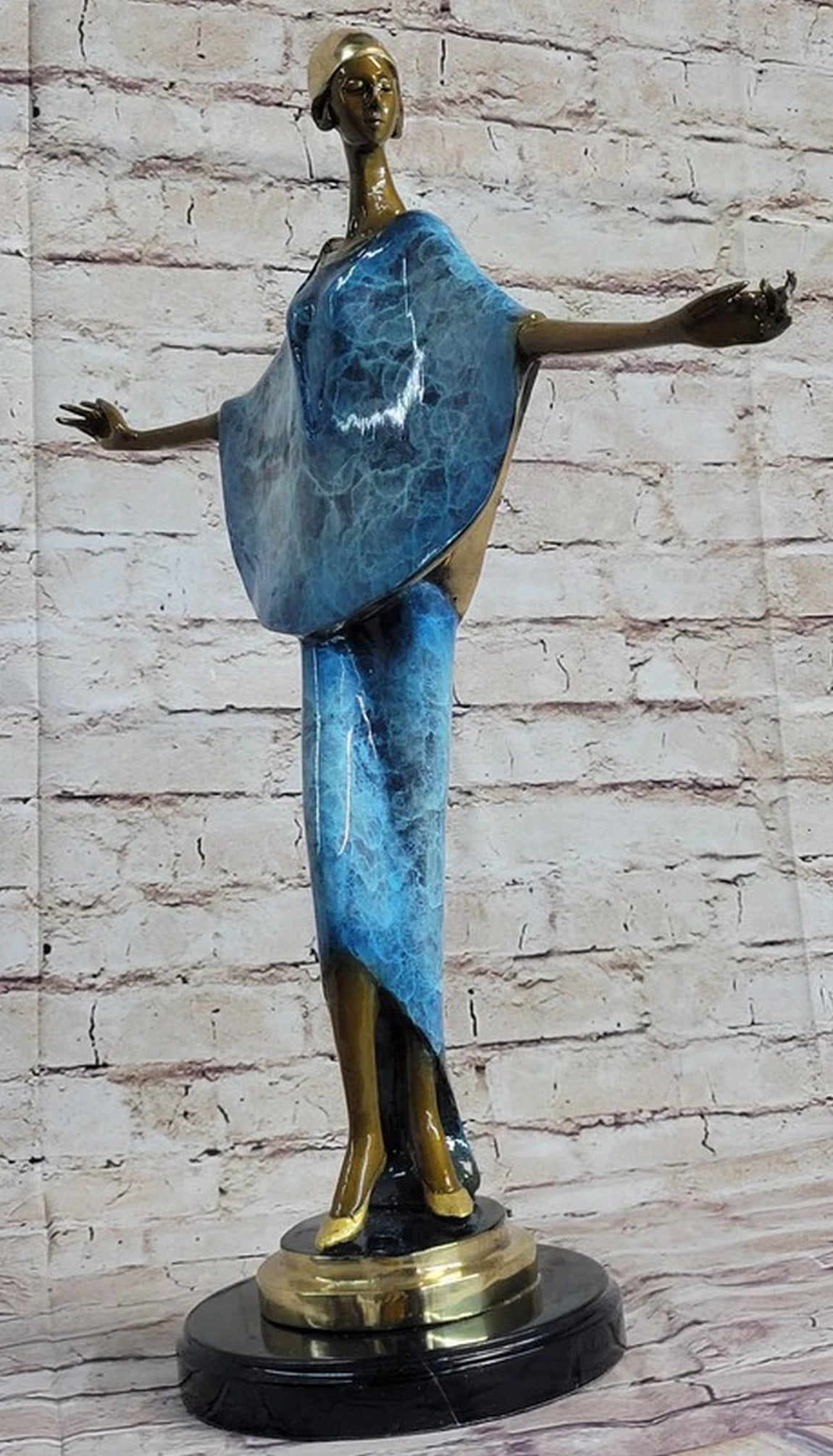 Erte Goddess of Love Bronze: Bronze Dimensions with Marble Base:Height 20" x Width 17"Marble Dimensions:Diameter 6"Height without base: 19"Weight : 12 LBSInventory 64Original or Reproduction: Reproduction