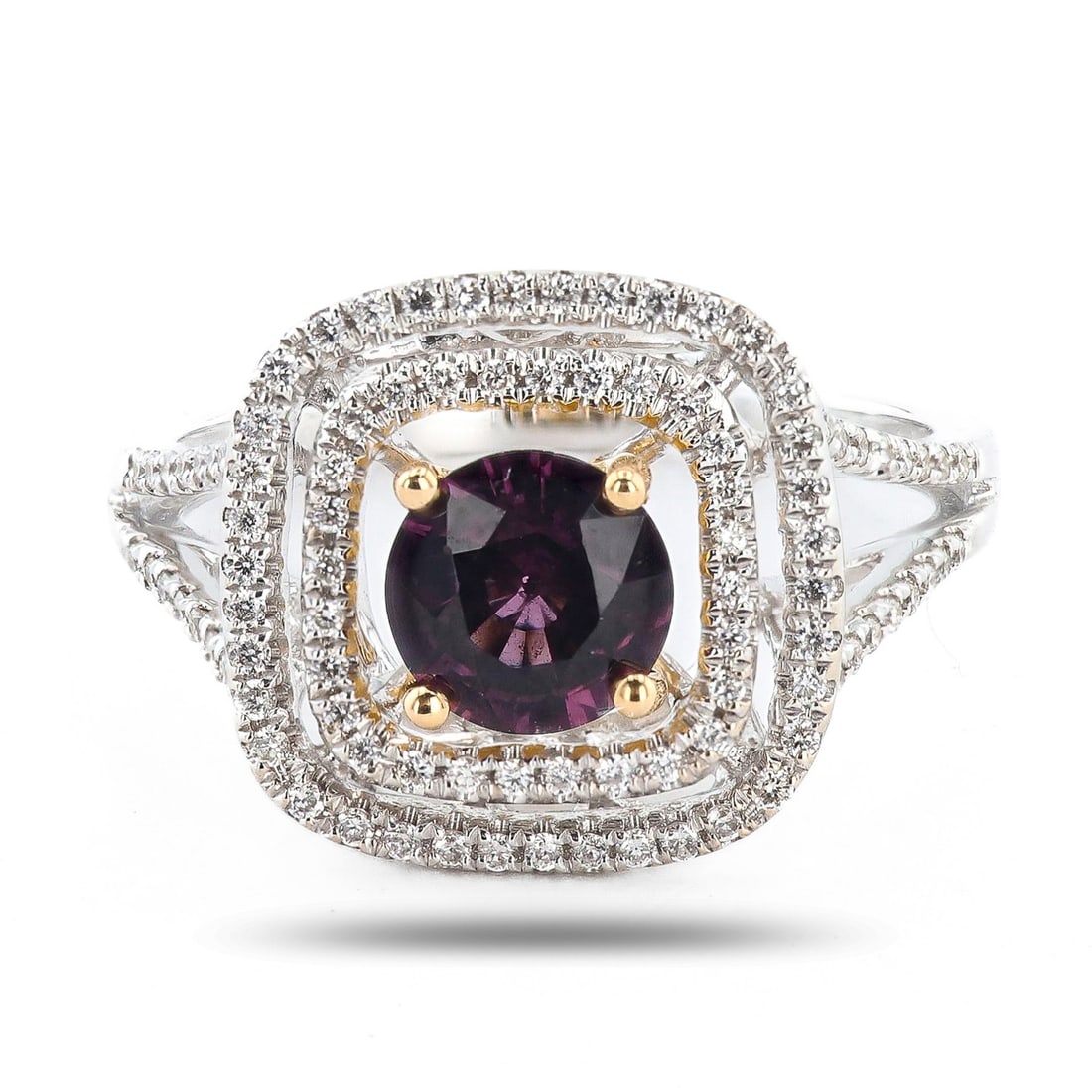 1.03ct Purplish Pink Spinel and 0.30ctw Diamond 18K White and Yellow Gold Ring: Eighteen karat (18K) two tone gold natural spinel and diamond ring. A round brilliant cut natural spinel gemstone is mounted in the center of the ring. Round brilliant cut diamonds accent the ring aro