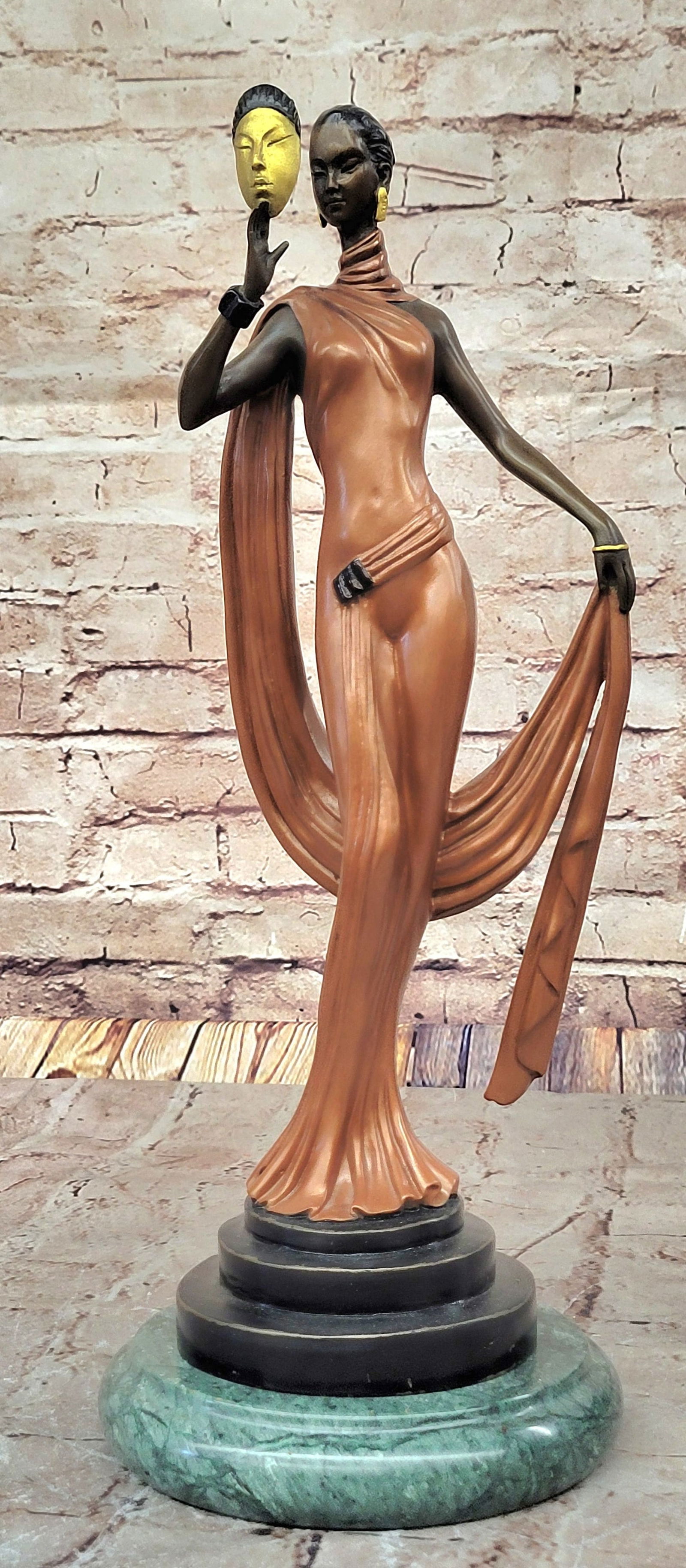 J. Erte Art Deco Bronze Lady with Mask ? Elegant Figurine in Flowing Dress on Marble Base: Bronze Dimensions with Marble Base: Height 16.5" X Width 6"Marble Dimensions: Diameter 6"Height without base:15"Weight:11 LBSOriginal or Reproduction: Reproduction