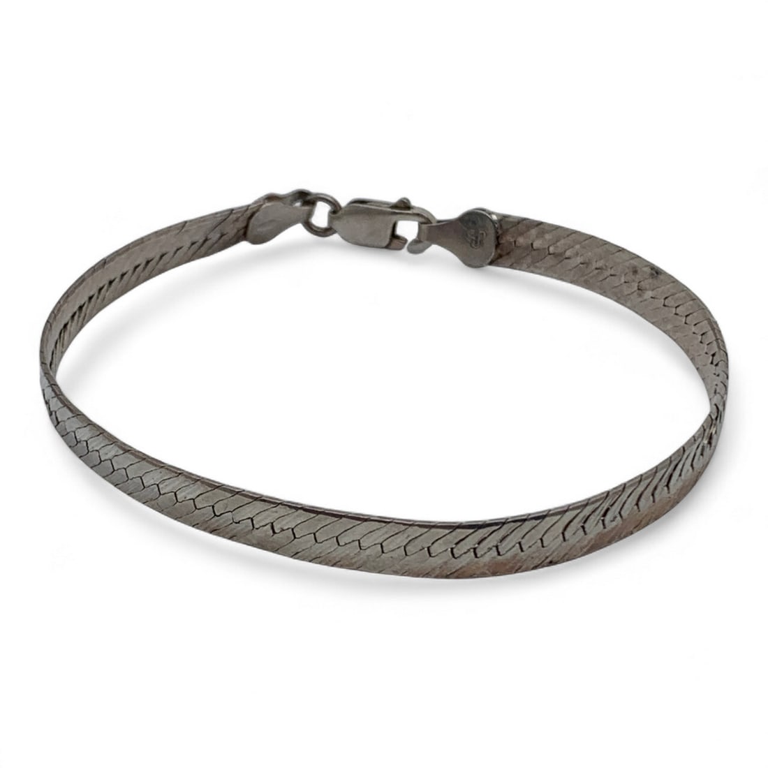 Sterling Silver Bracelet: Marked 925. 725" Long. 6.1 G.