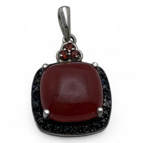 Sterling Silver Pendant With Red Stones
