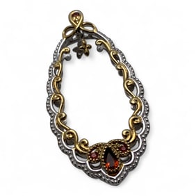 Sterling Silver Pendant With Red Stones