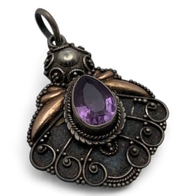 Sterling Silver Pendant With Purple Stone