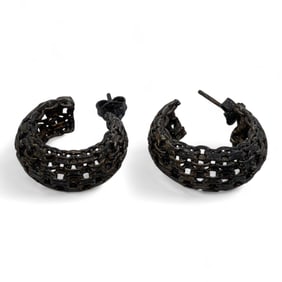 Pair Of Silver Earrings