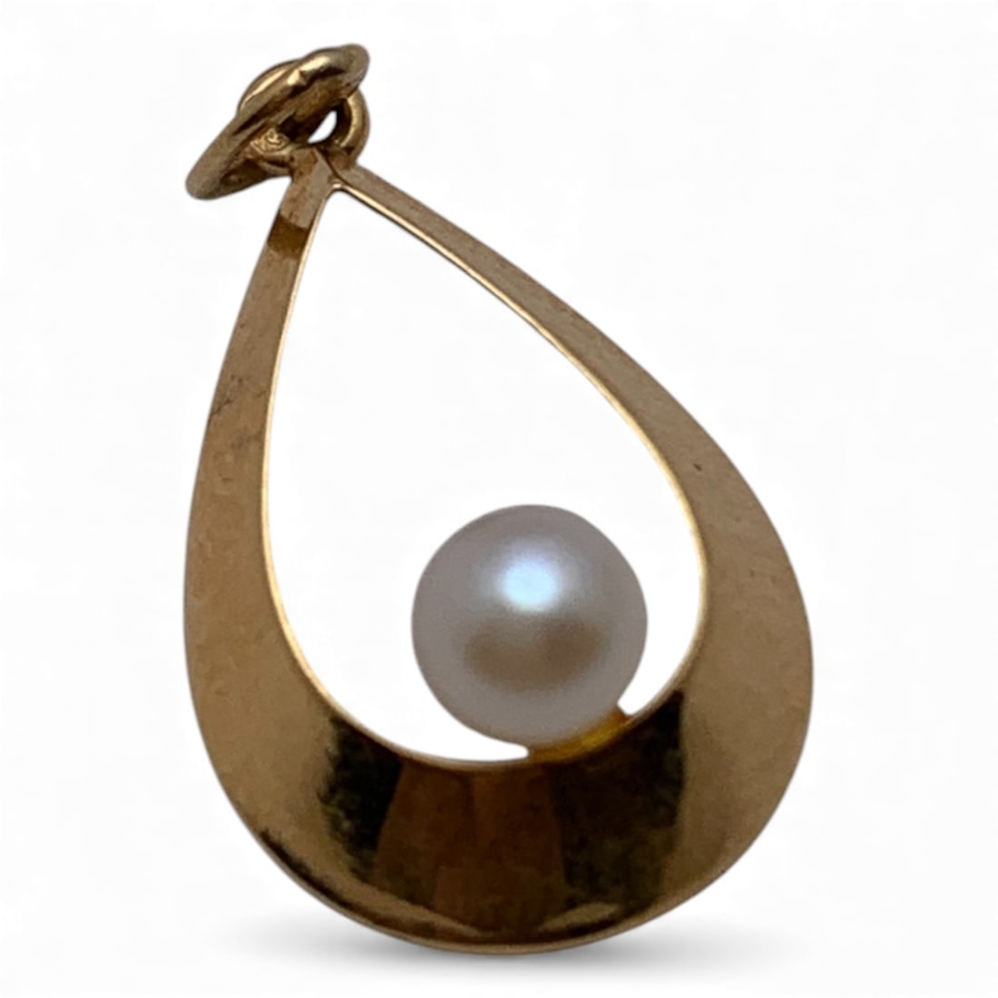 10k Gold And Pearl Pendant: Marked 10k. 0.3 Dwt. 3/4" Long.