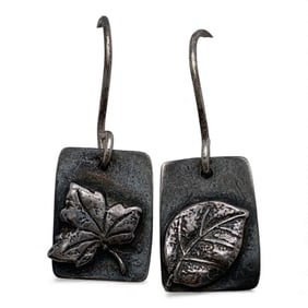Pair Of Silver Earrings