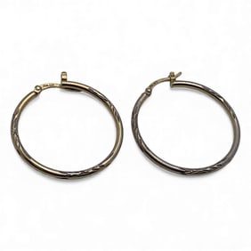 Pair Of Sterling Silver Hoop Earrings