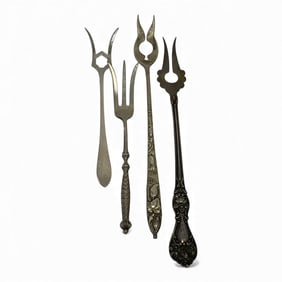 Group Of 4 Sterling Silver Pickle Forks