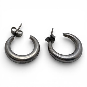 Pair Of Silver Earrings