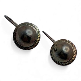 Pair Of Silver Earrings