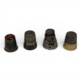 Group Of 4 Sterling Silver Thimbles