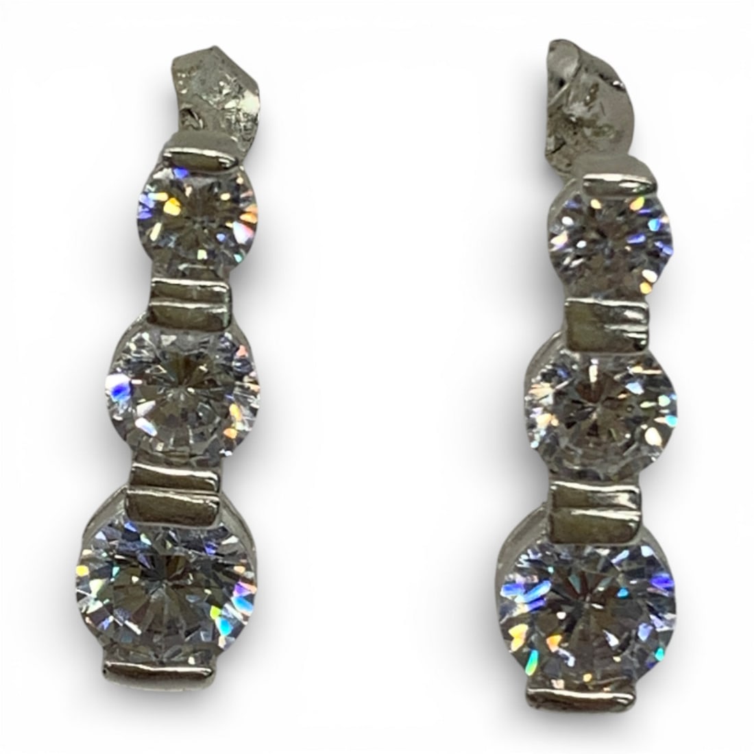 Pair Of Sterling Silver And Clear Stone Earrings: In Jewelry Case.Marked 925. 3.1 G. 3/4" Long.