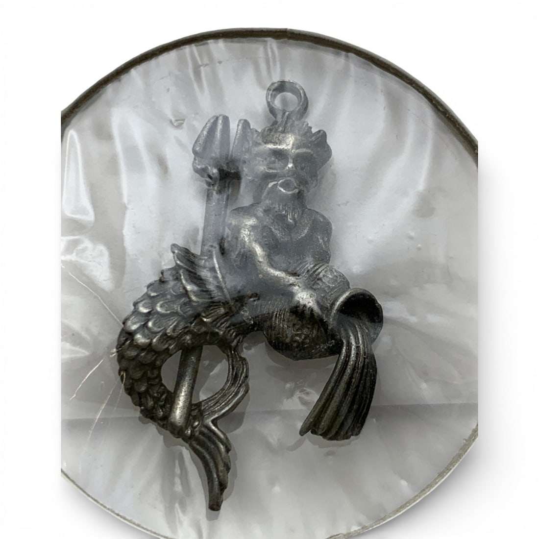 Neptune Charm: See Photos