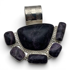 Sterling Silver Pendant With Purple Stones