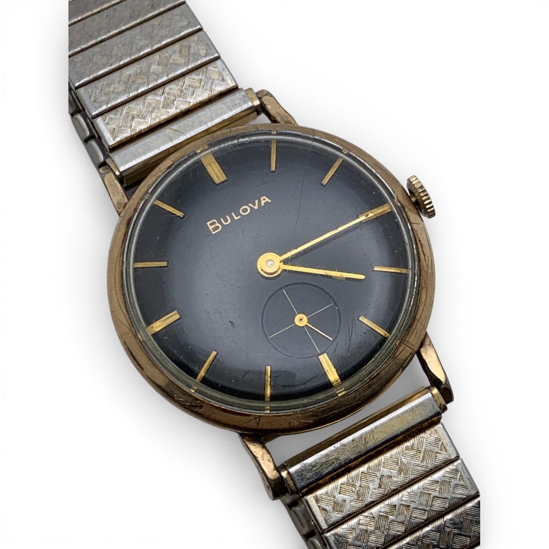 Vintage Bulova 10k Rolled Gold Plate Wrist Watch: Marked On Face: BulovaMarked On Back: Bulova, 10k Rolled Gold Plate, D851348Marked On Band: Twiston1 1/4" Face Diameter - 47.0 Grams