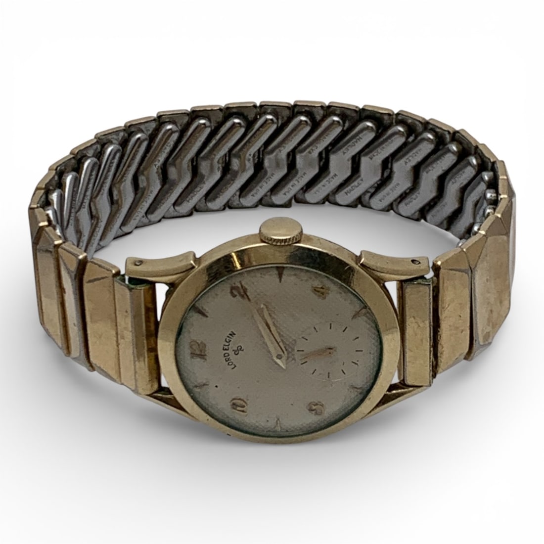 Lord Elgin Gold Filled Stretch Band Wrist Watch: Marked On Face: Lord ElginMarked On Band: 1/20 10k G.f. 1 1/8" Face Diameter - 44.8 Grams