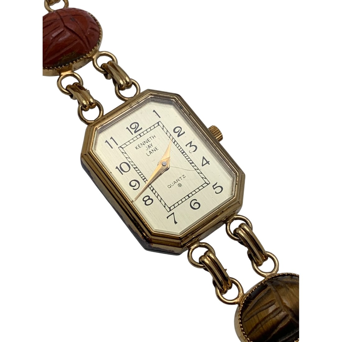 Kenneth Jay Lane Wrist Watch W Carved Stones: Marked On Face: Kenneth Jay Lane, QuartzMarked On Back: Stainless Steel Back, Base Metal Bezel7 1/2" Long - 3/4" Face Diameter