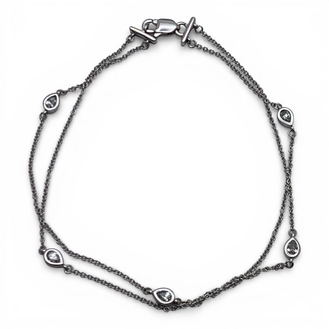 10k White Gold & Diamond Bracelet: Marked 10k - 7 1/4" Long - 1.5 DwtGemstones Tested With Presidium Gem Tester Il - Berners Does Not Guarantee Authenticity Of Gemstones