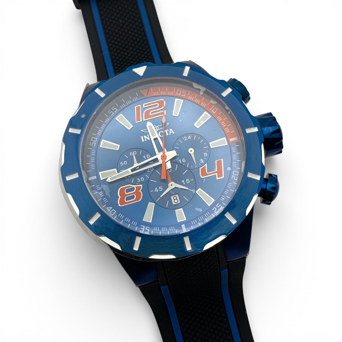 Men's Invicta Wrist Watch: Marked On Face: InvictaMarked On Back: Invicta Going The Distance Trinite Night Glow, Stainless Steel Case, Japan Chronograph2" Face Diameter - 10" Long Includes Presentation Box